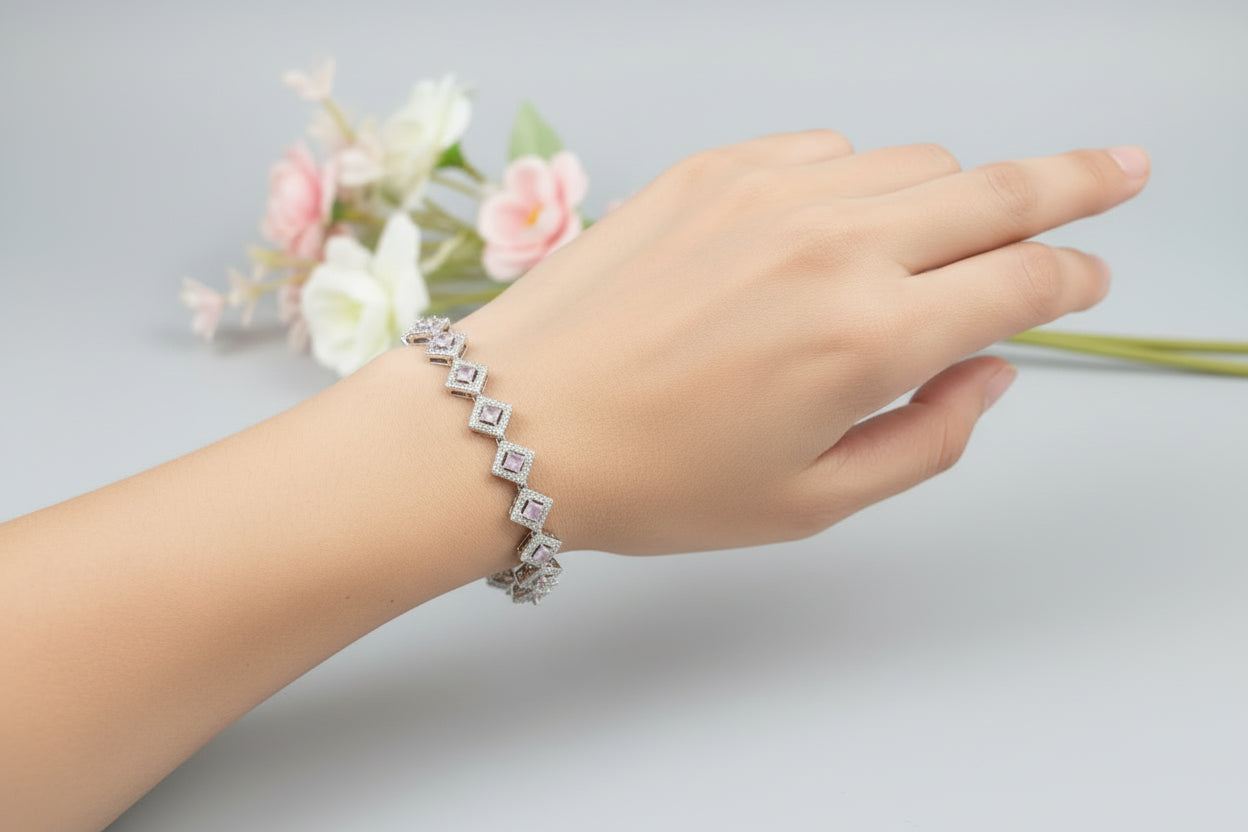 Diamond bracelet on a textured gray surface