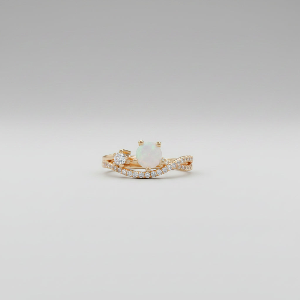 Gold ring on a glass surface with a blurred background