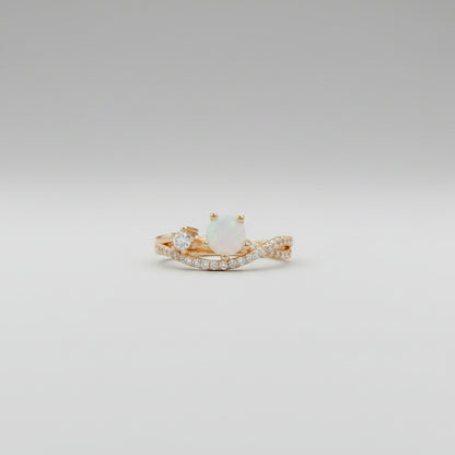 Gold ring on a glass surface with a blurred background