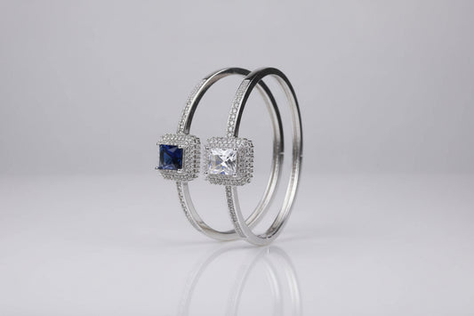 Close-up of a decorative wheel with gemstones on a blurred background