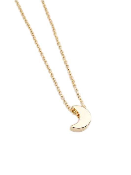 Gold necklace with a crescent moon pendant on a white background